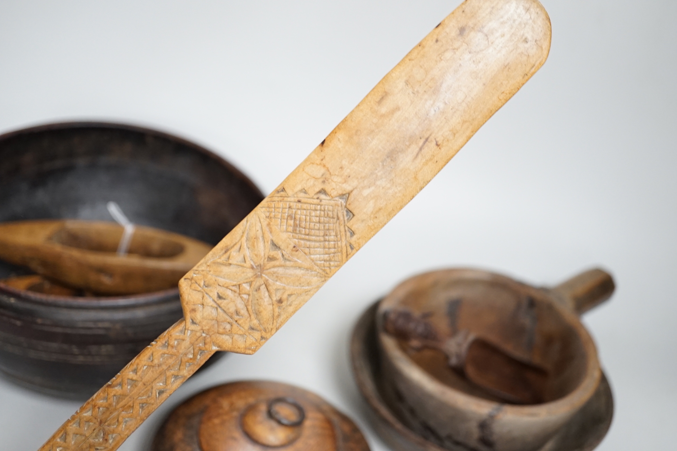 A group of treen, including chip-carved love token, 35cm (9)